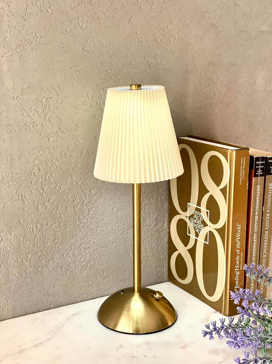 Elegant Gold Table Lamp with Pleated White Shade Design